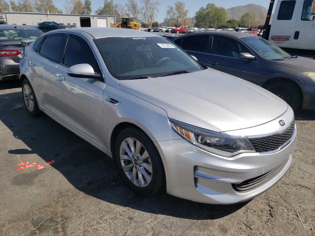 KIA OPTIMA LX 2016 with VIN 5XXGT4L33GG035823 - Photo from auction