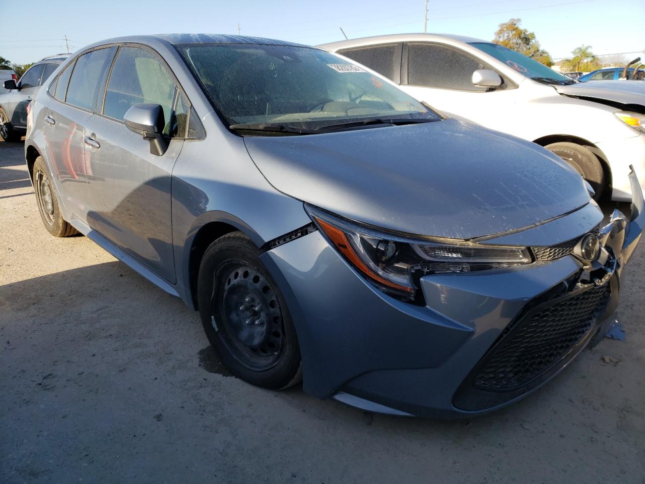 TOYOTA COROLLA LE 2021 with VIN JTDEPMAE0MJ125499 - Photo from auction