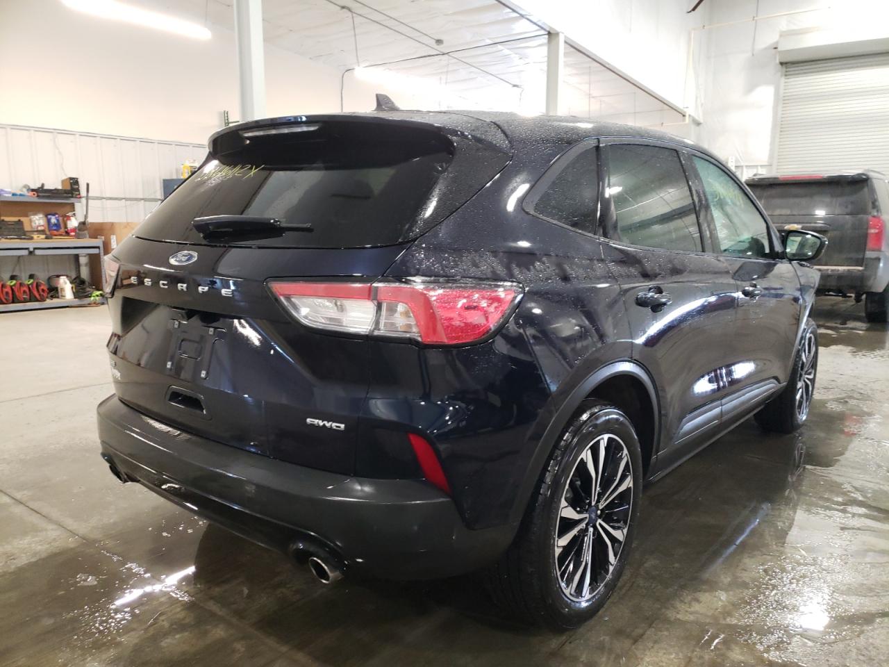 Photo 4 from auction – 2021 FORD ESCAPE SE with VIN 1FMCU9G69MUB07154