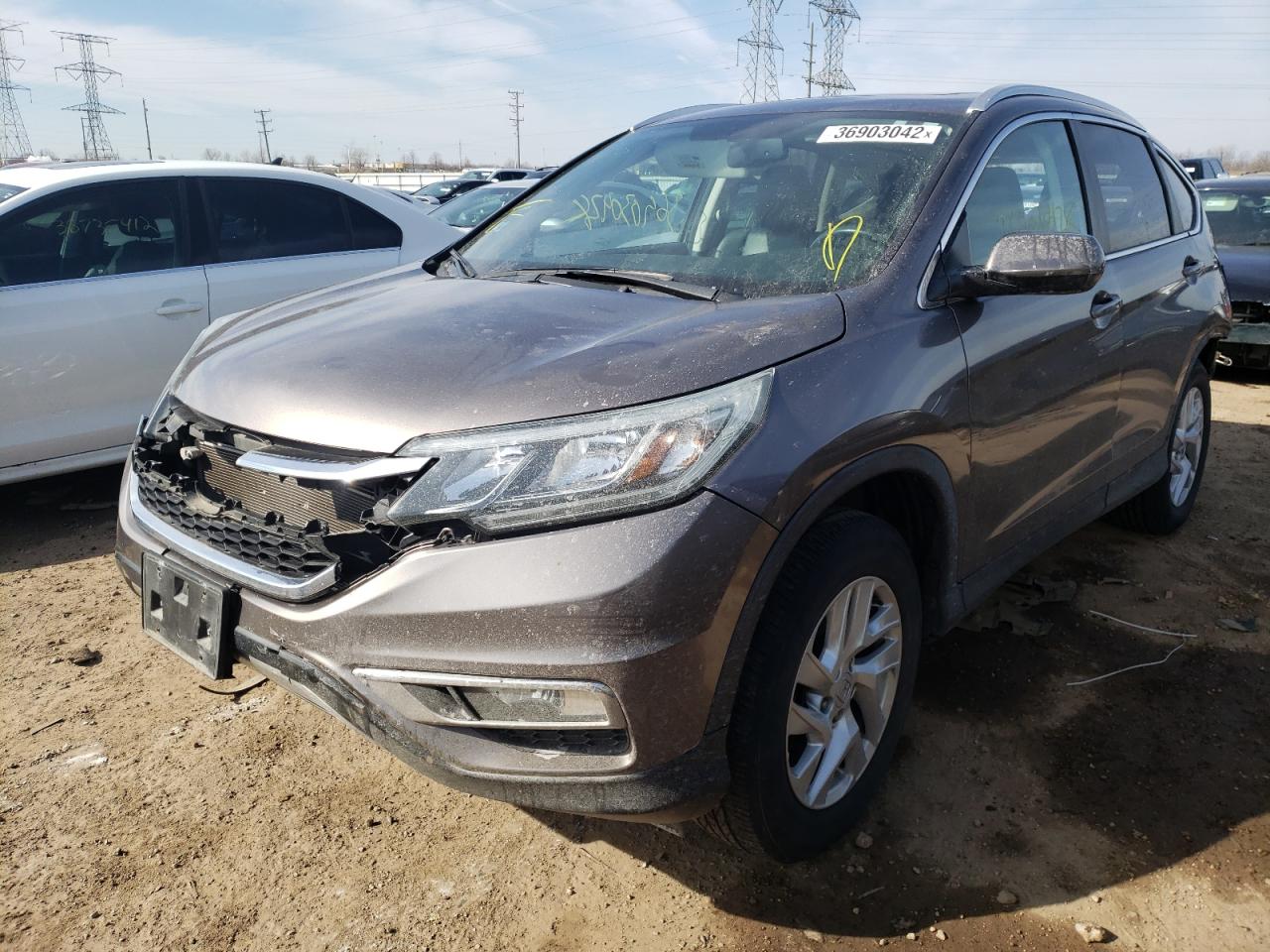 Photo 2 from auction – 2015 HONDA CR-V EXL with VIN 5J6RM4H79FL037053