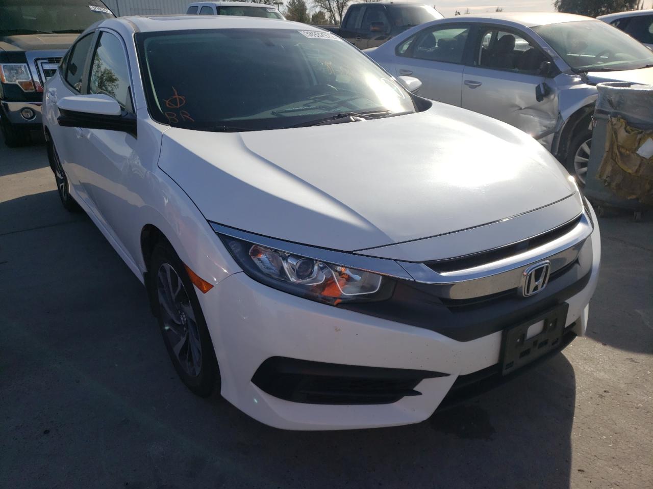 HONDA CIVIC EX 2018 with VIN 19XFC2F73JE208139 - Photo from auction
