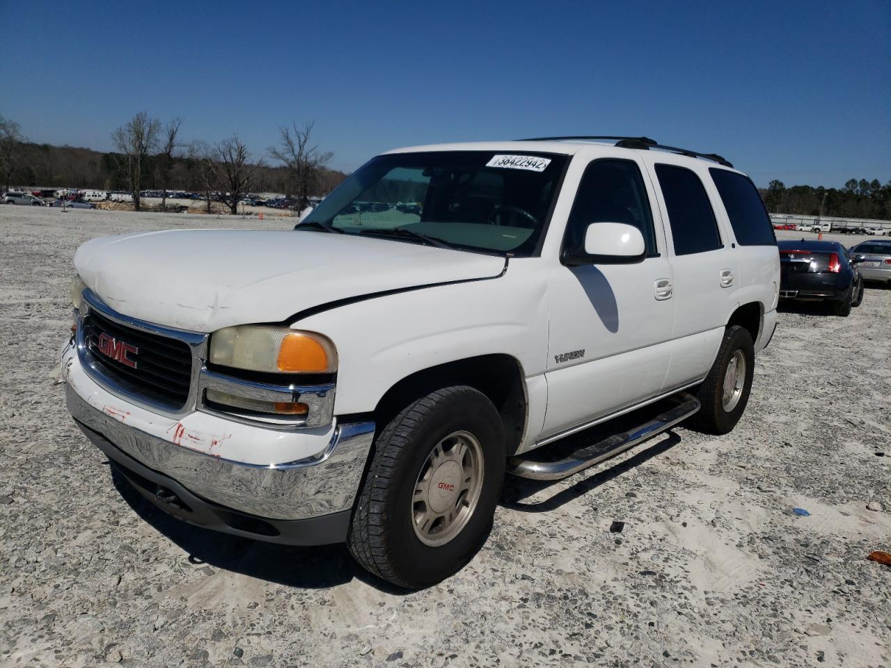Photo 2 from auction – 2002 GMC YUKON with VIN 1GKEC13VX2J115832