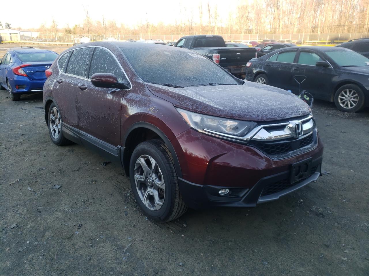 HONDA CR-V EX 2019 with VIN 7FARW2H59KE013470 - Photo from auction