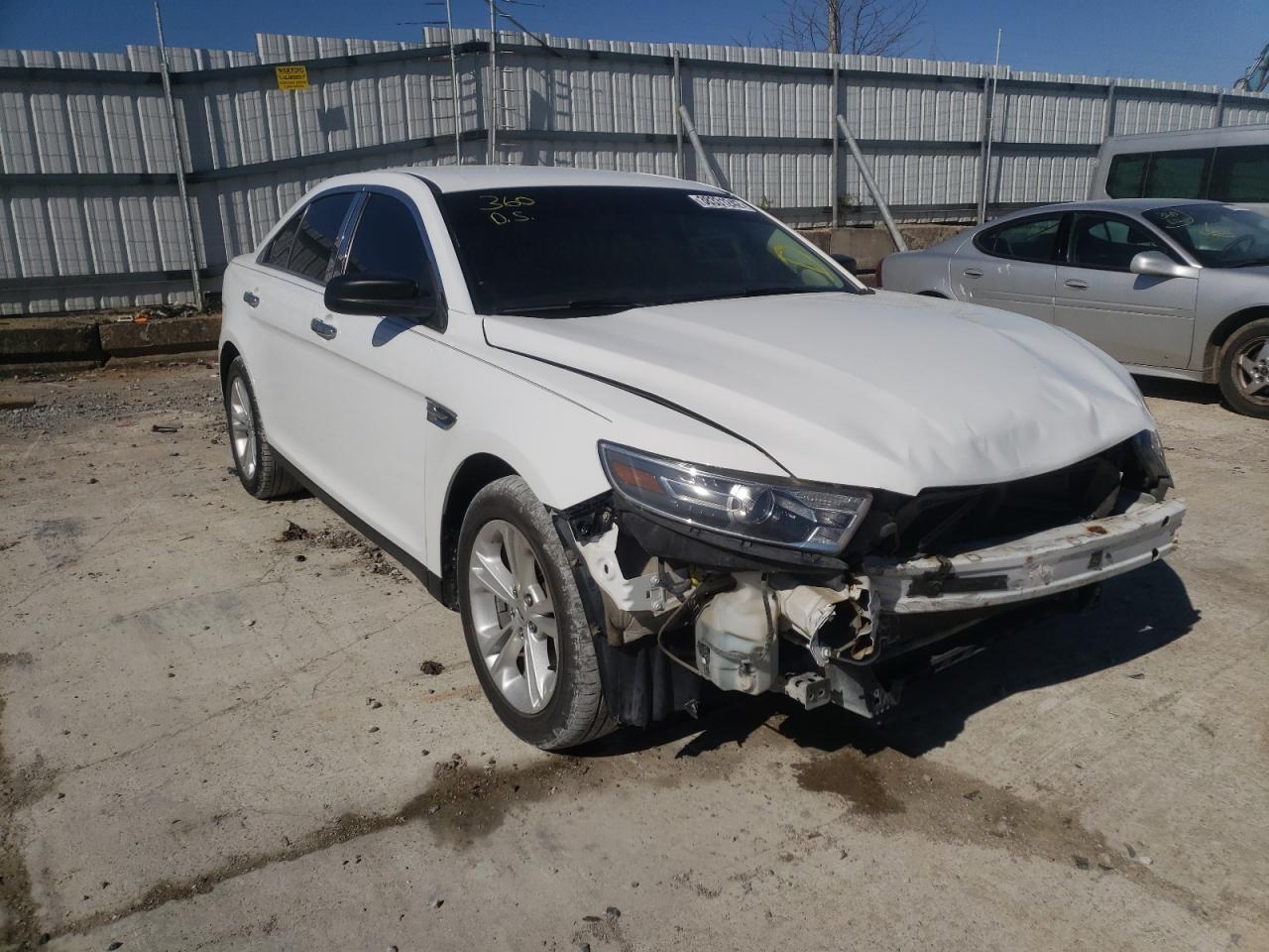 FORD TAURUS SE 2015 with VIN 1FAHP2D83FG142889 - Photo from auction