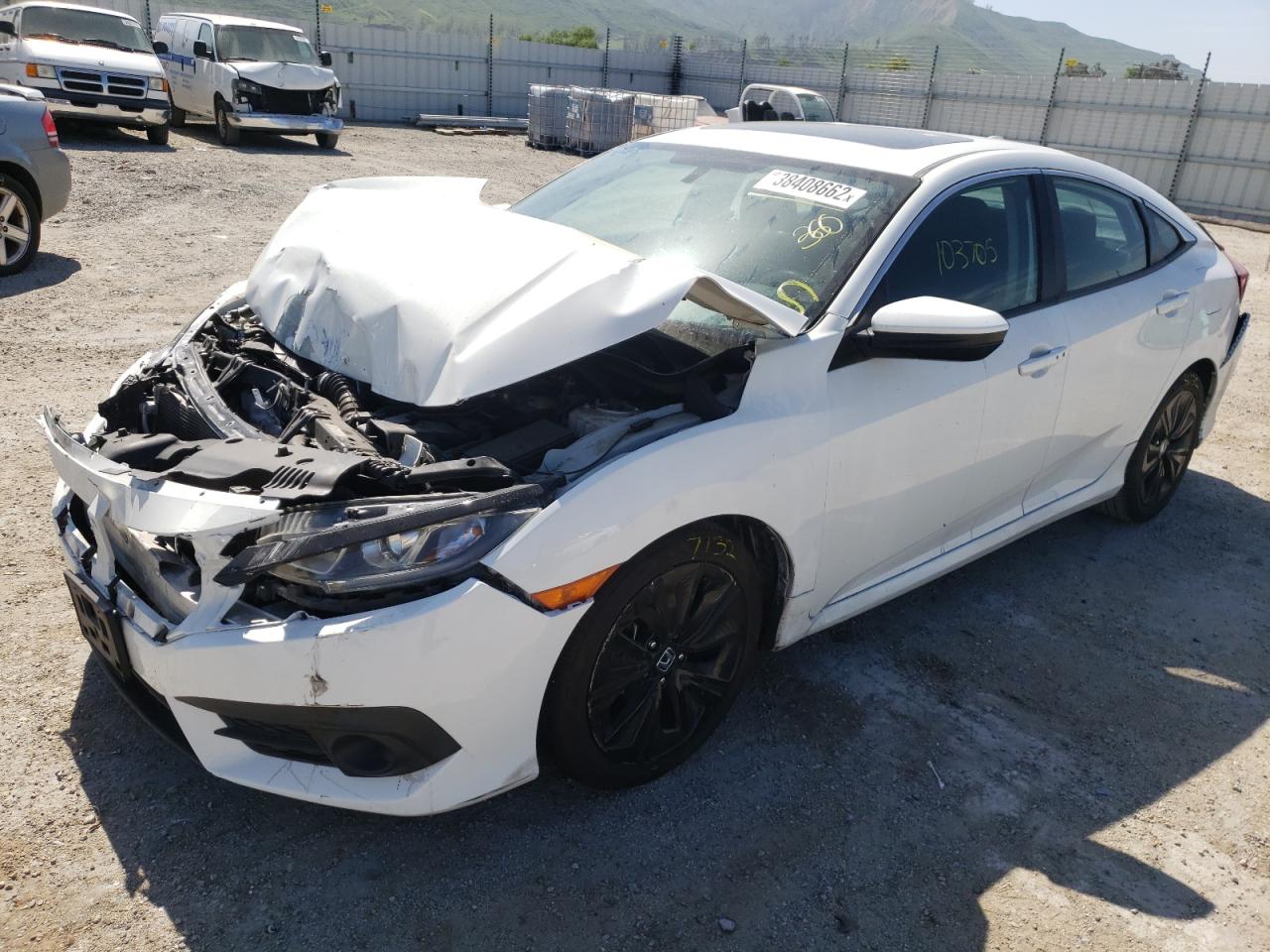 Photo 2 from auction – 2016 HONDA CIVIC EX with VIN 2HGFC1F32GH656703