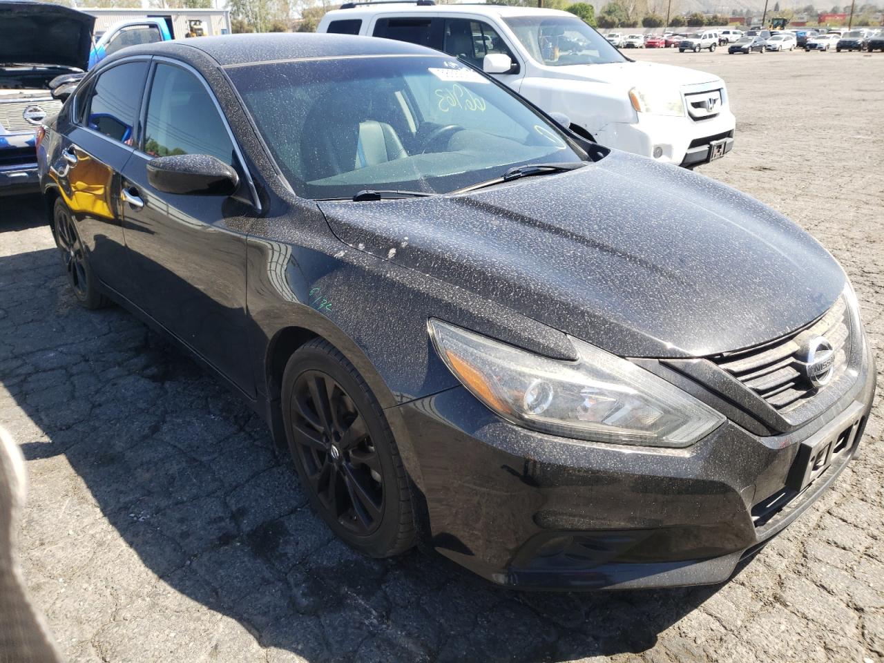 NISSAN ALTIMA 2.5 2018 with VIN 1N4AL3AP7JC184027 - Photo from auction