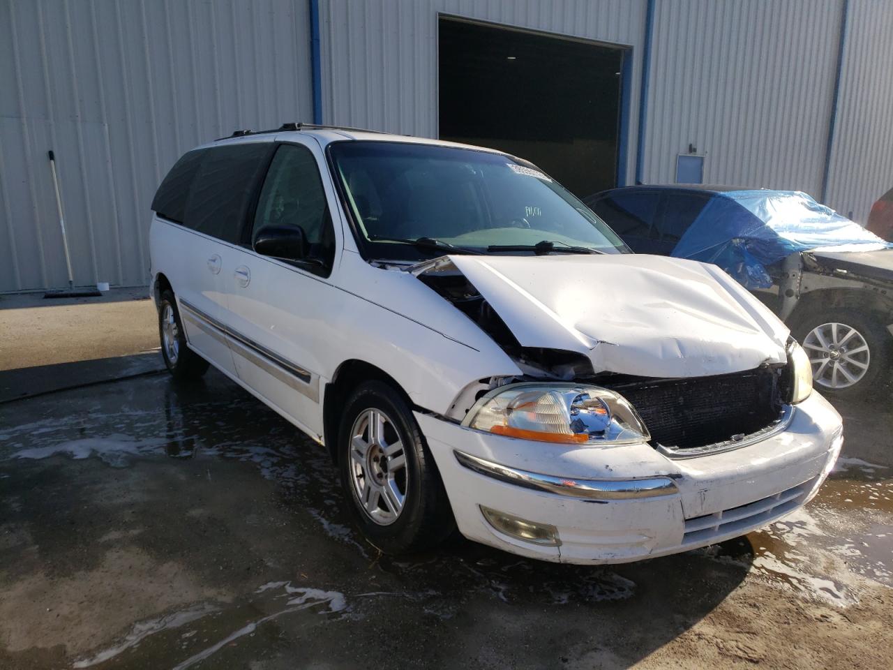 FORD WINDSTAR S 2002 with VIN 2FMZA52432BA70204 - Photo from auction