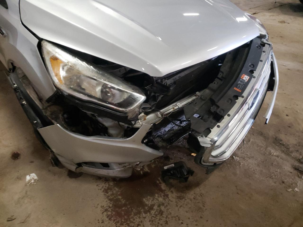 Photo 9 from auction – 2017 FORD ESCAPE SE with VIN 1FMCU9G95HUB08429