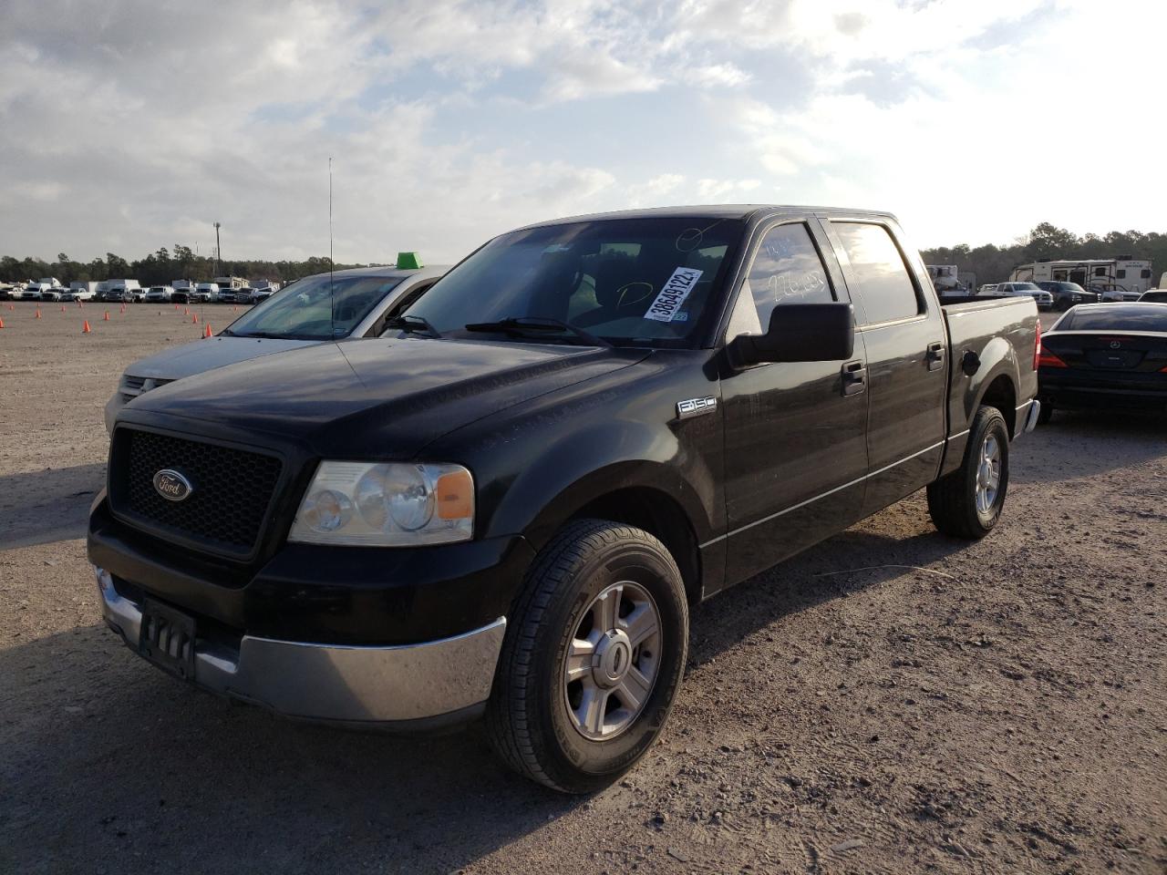 Photo 2 from auction – 2004 FORD F150 SUPER with VIN 1FTRW12WX4KC90352