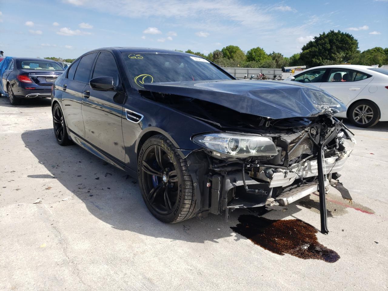 BMW M5 2015 with VIN WBSFV9C59FD594881 - Photo from auction