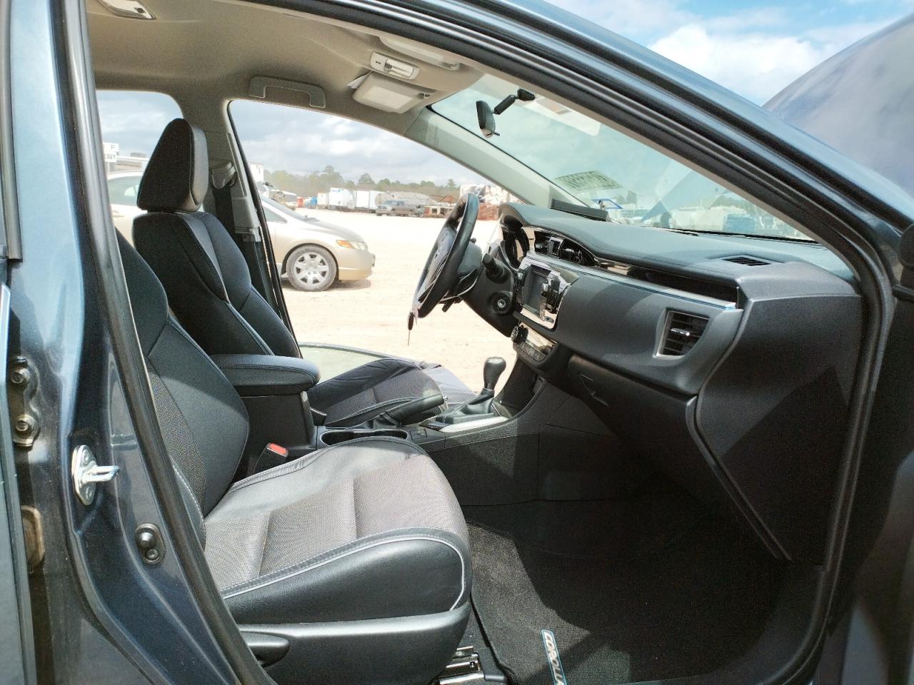 Photo 5 from auction – 2016 TOYOTA COROLLA L with VIN 5YFBURHE2GP375275