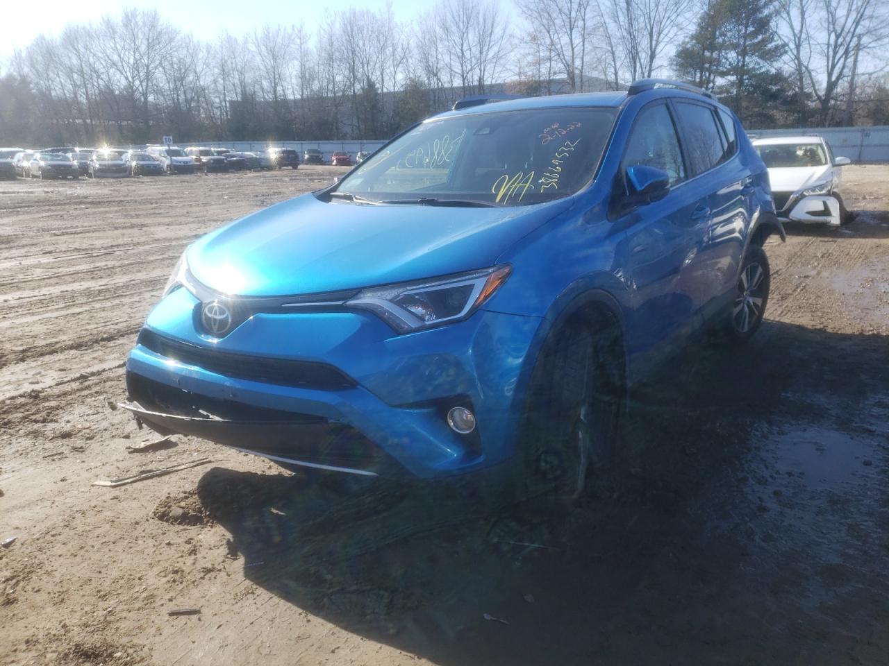 Photo 2 from auction – 2017 TOYOTA RAV4 XLE with VIN JTMRFREV7HJ712865