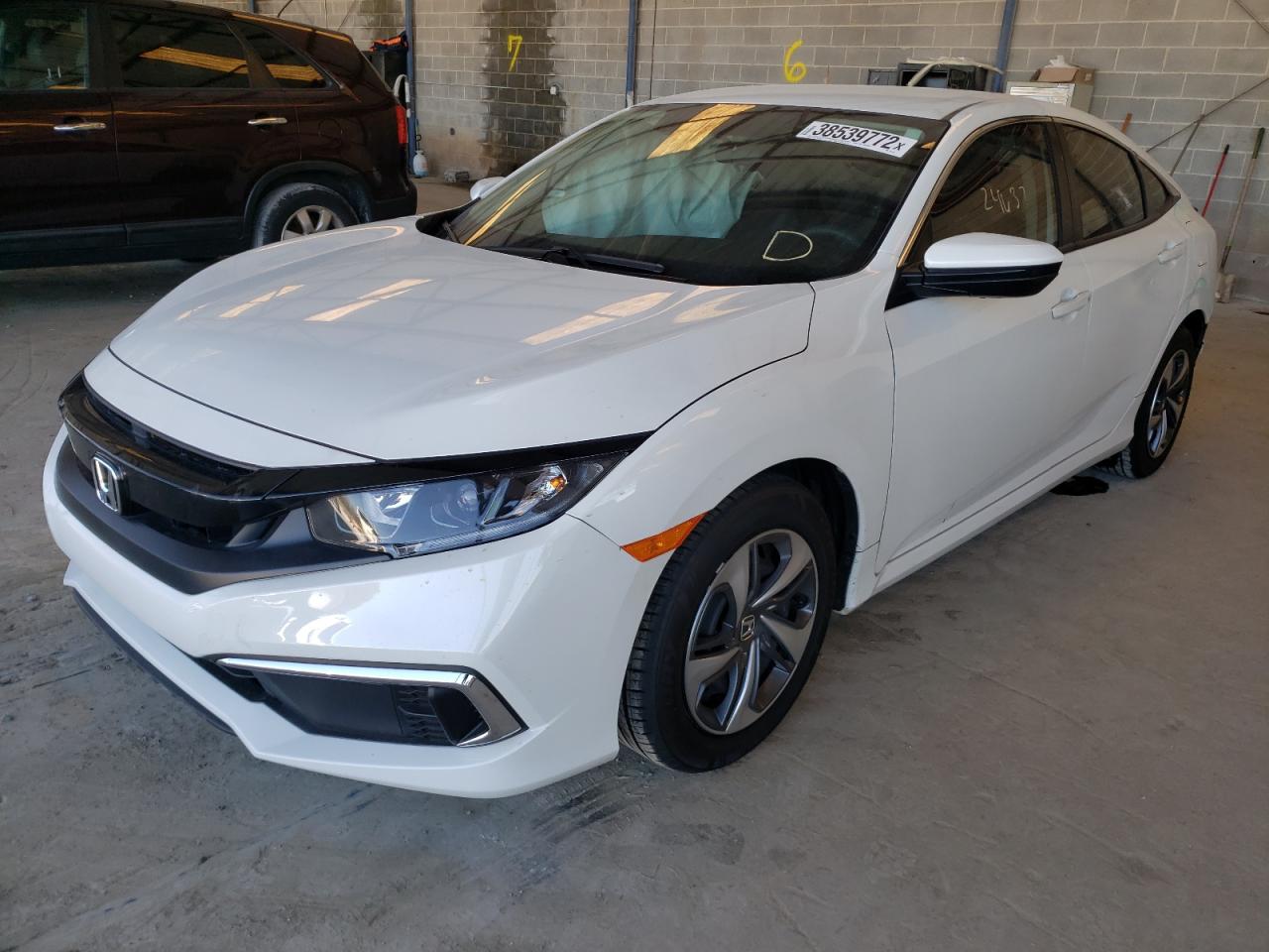 Photo 2 from auction – 2021 HONDA CIVIC LX with VIN 2HGFC2F63MH547730