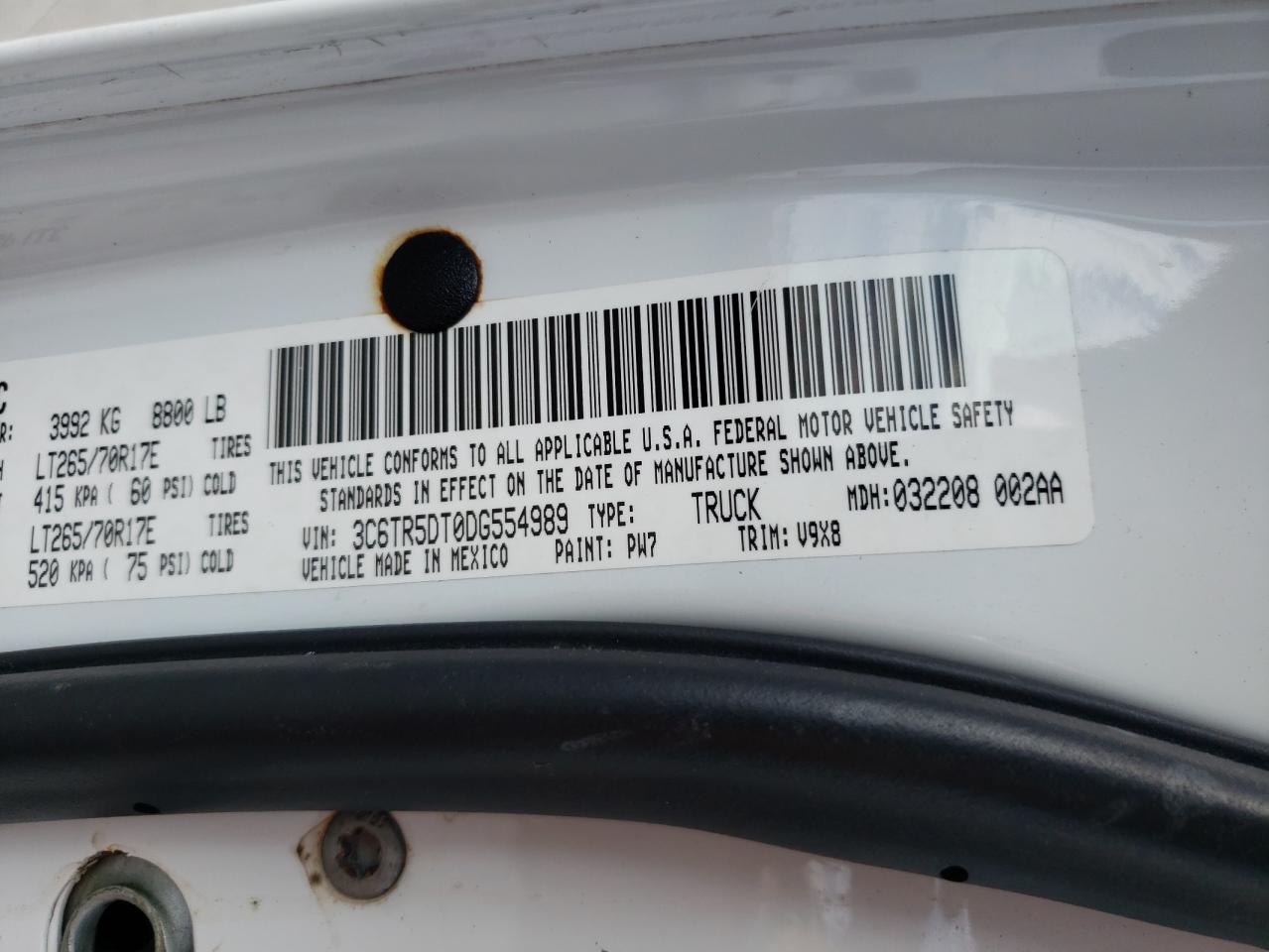 Photo 10 from auction – 2013 RAM 2500 SLT with VIN 3C6TR5DT0DG554989