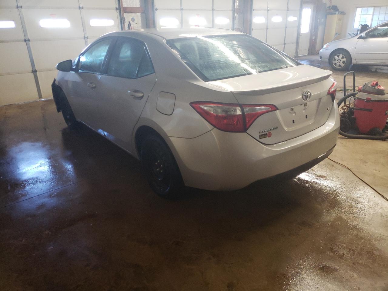 Photo 3 from auction – 2014 TOYOTA COROLLA L with VIN 5YFBURHE7EP101888