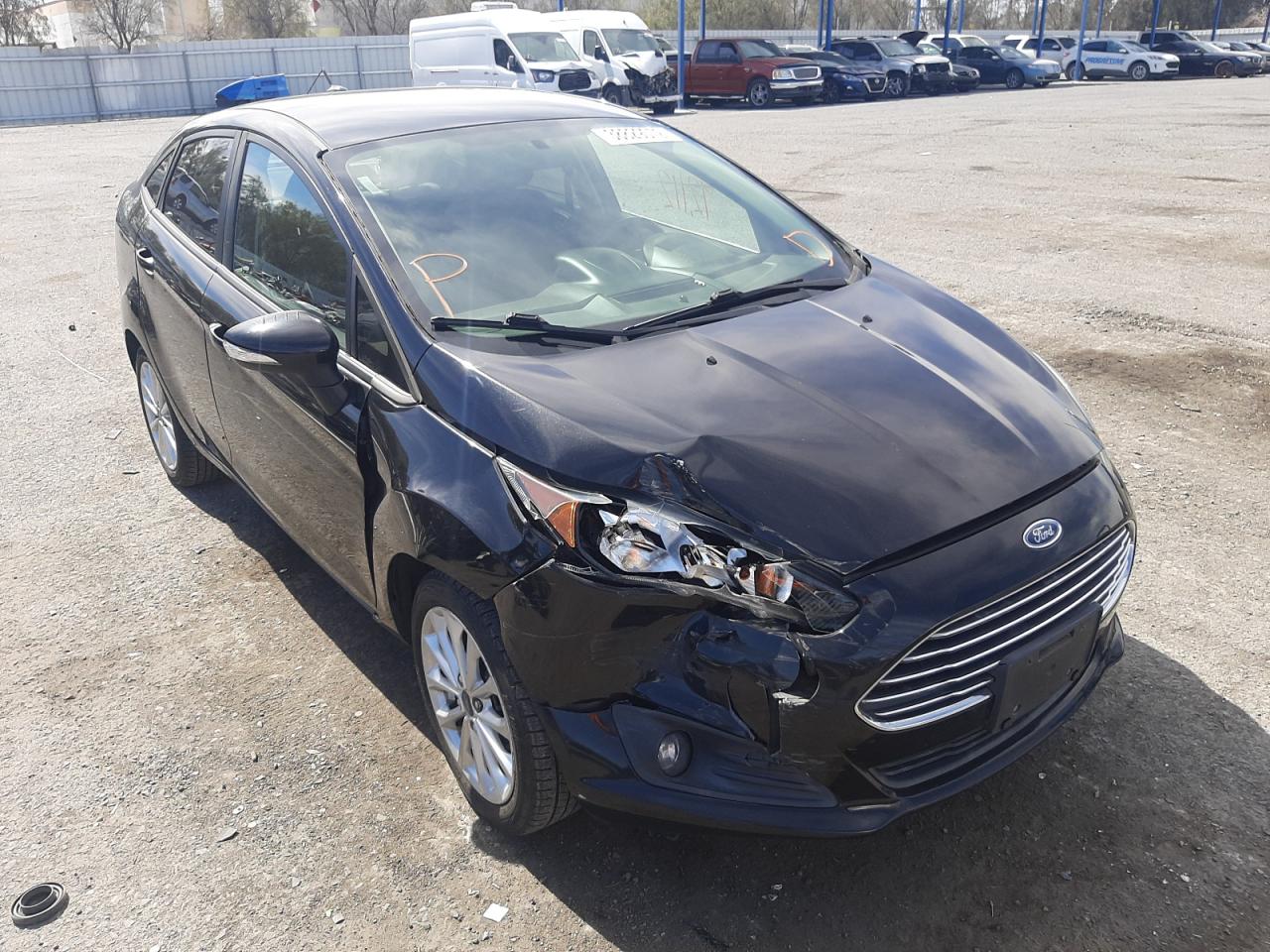 FORD FIESTA SE 2014 with VIN 3FADP4BJ7EM203536 - Photo from auction