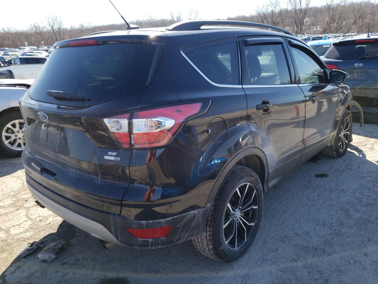 Photo 4 from auction – 2017 FORD ESCAPE SE with VIN 1FMCU9G95HUD96369