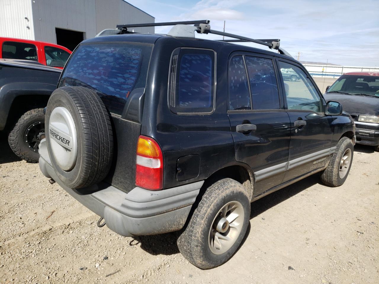 Photo 14 from auction – 2000 CHEVROLET TRACKER with VIN 2CNBJ13C0Y6908710