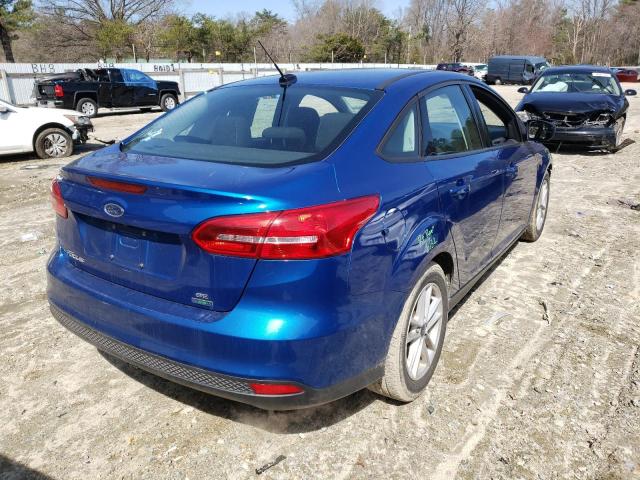 Photo 4 from auction – 2018 FORD FOCUS SE with VIN 1FADP3FEXJL215201