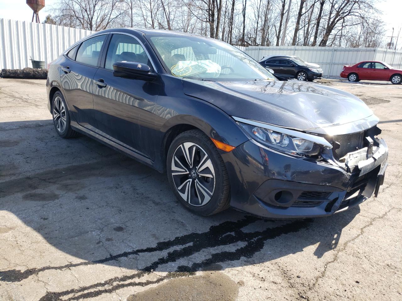 HONDA CIVIC EXL 2017 with VIN 19XFC1F73HE214527 - Photo from auction