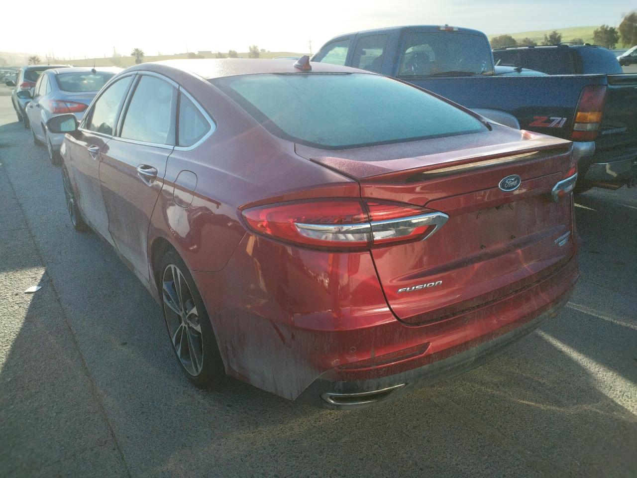 Photo 3 from auction – 2019 FORD FUSION TIT with VIN 3FA6P0D90KR143148