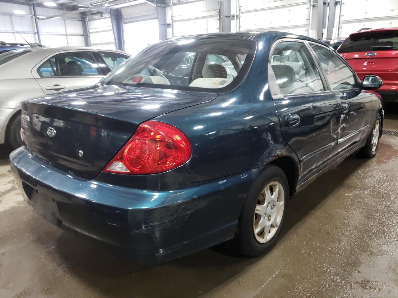 Photo 4 from auction – 2003 KIA SPECTRA BA with VIN KNAFB121435264469