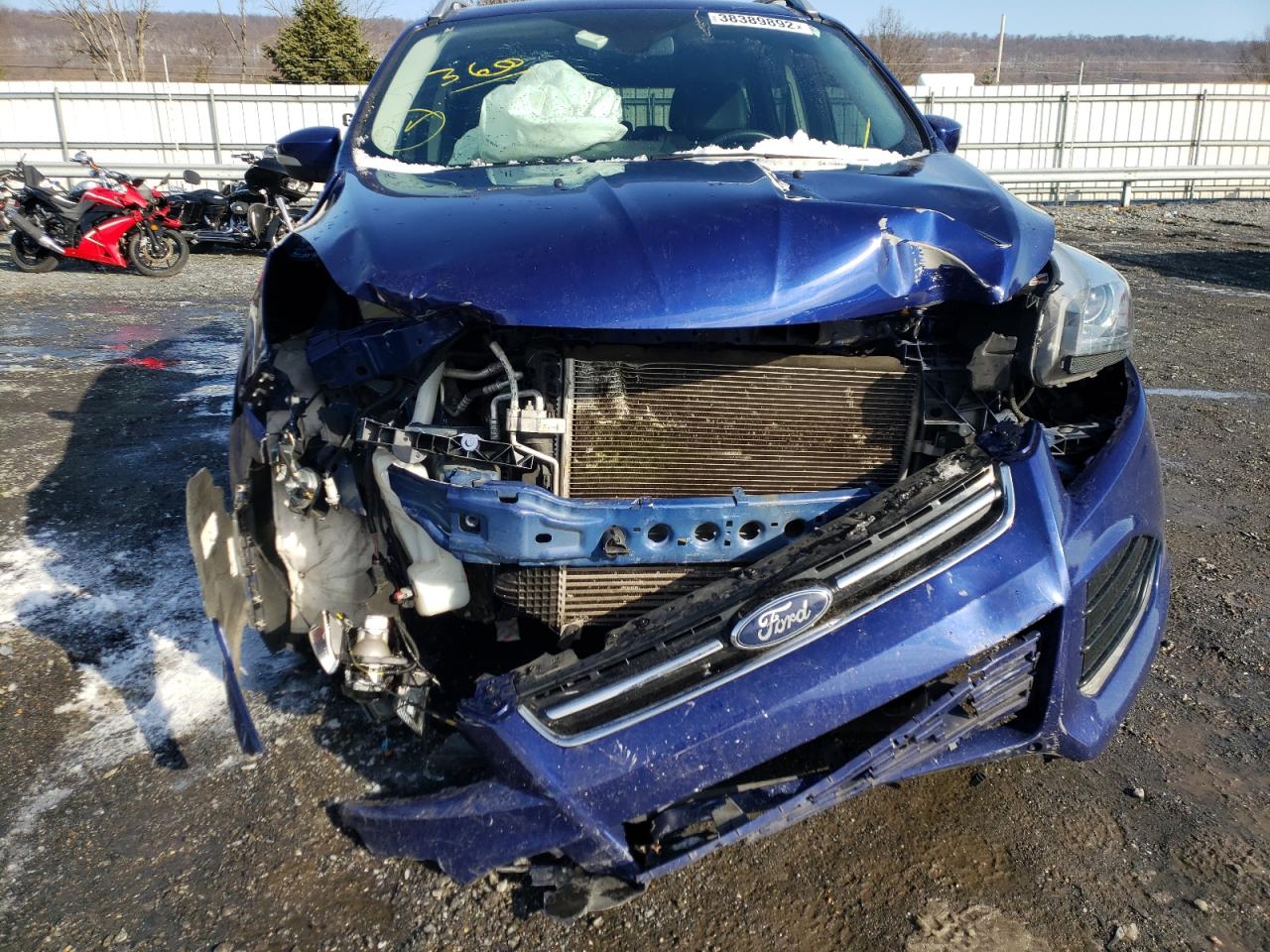 Photo 9 from auction – 2016 FORD ESCAPE with VIN 1FMCU9J98GUA80438