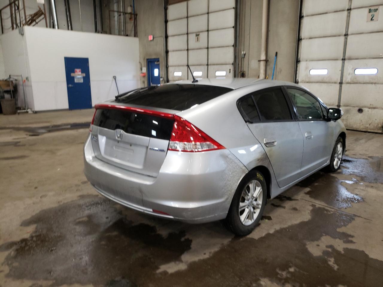 Photo 4 from auction – 2010 HONDA INSIGHT EX with VIN JHMZE2H72AS039649