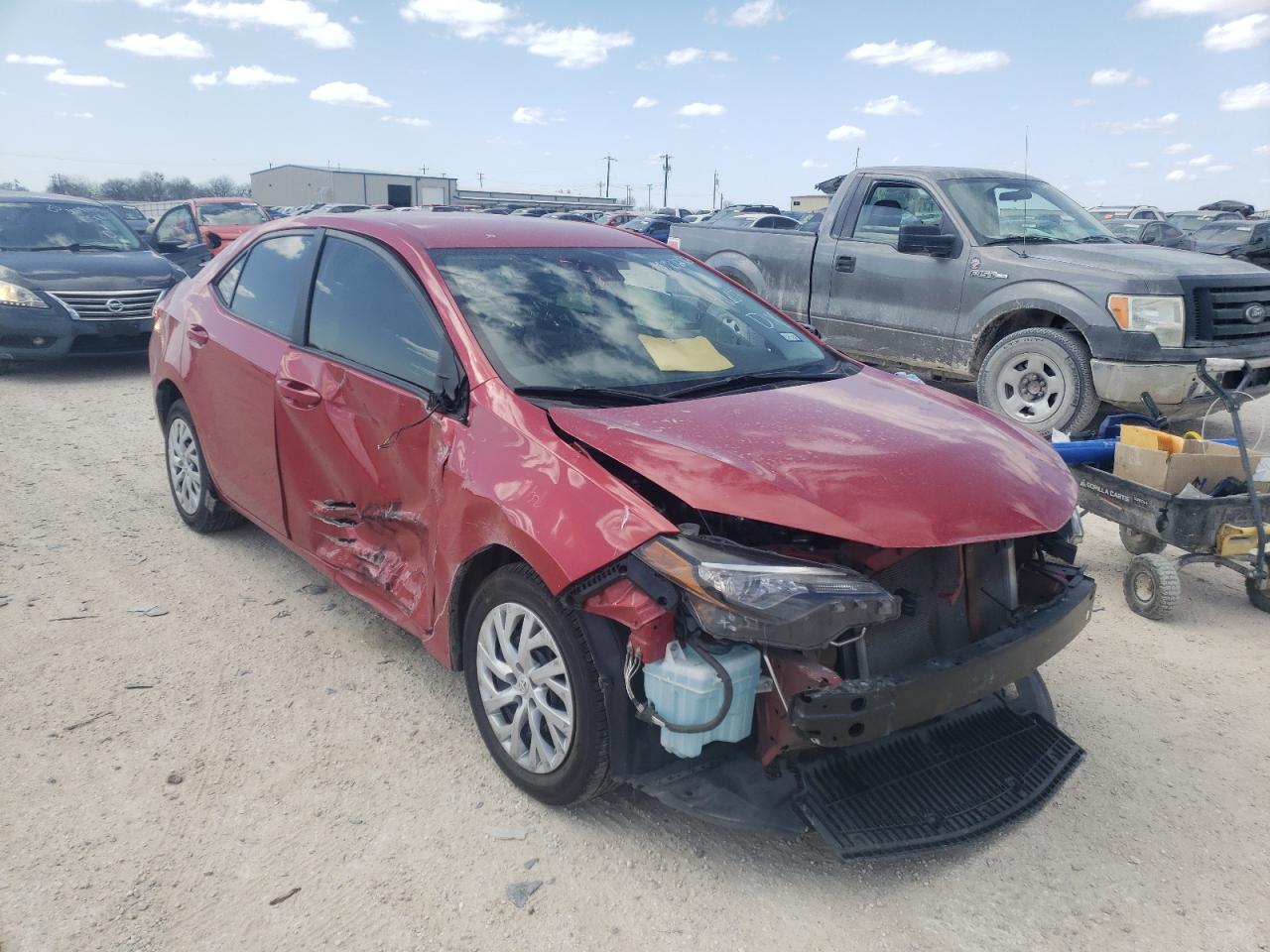 TOYOTA COROLLA L 2018 with VIN 5YFBURHE3JP775997 - Photo from auction