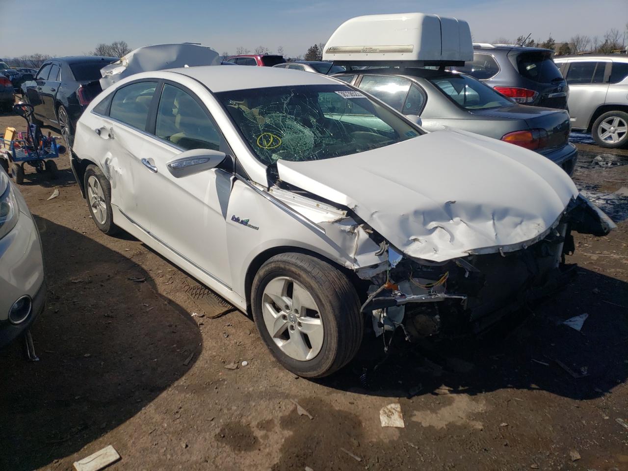 HYUNDAI SONATA HYB 2011 with VIN KMHEC4A47BA001032 - Photo from auction