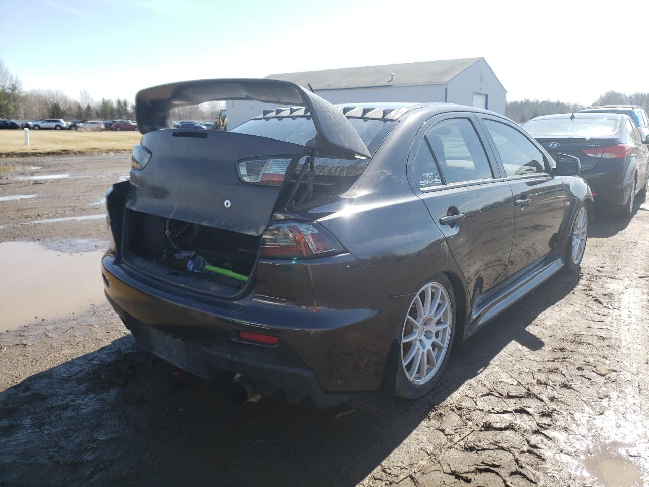 Photo 4 from auction – 2013 MITSUBISHI LANCER EVO with VIN JA32W8FV0DU011344