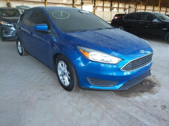 FORD FOCUS SE 2018 with VIN 1FADP3K24JL244771 - Photo from auction