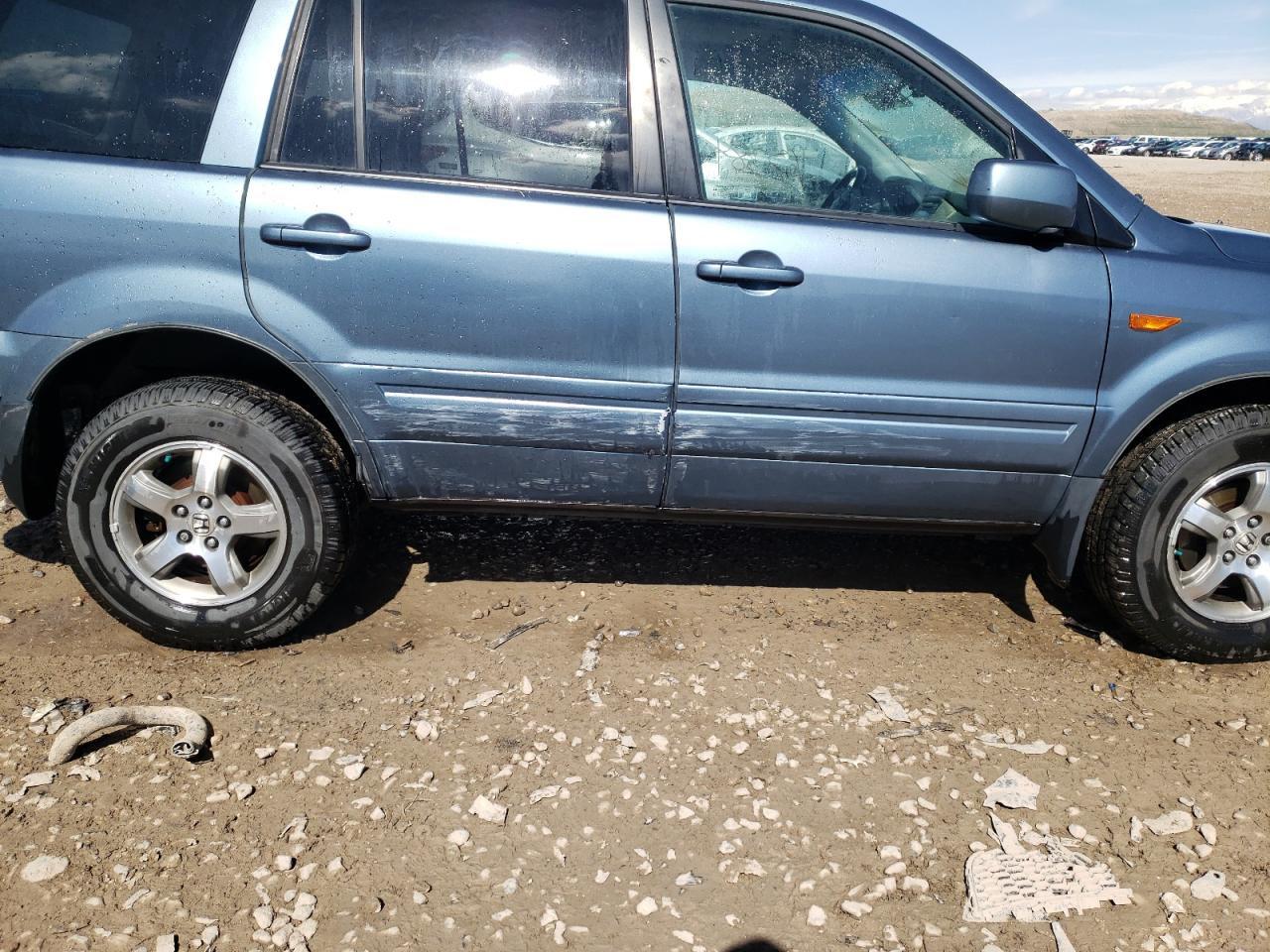 Photo 9 from auction – 2006 HONDA PILOT EX with VIN 5FNYF18546B011813