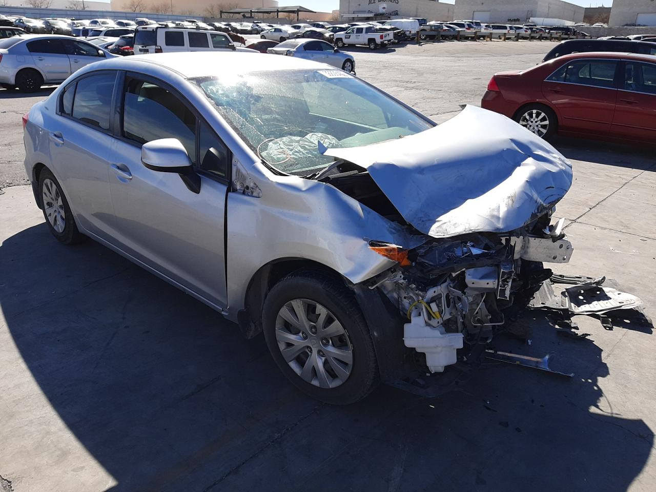 HONDA CIVIC LX 2012 with VIN 2HGFB2F53CH605831 - Photo from auction