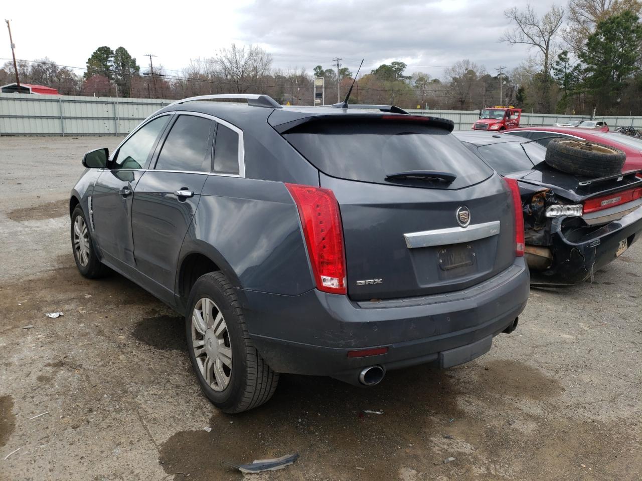 Photo 3 from auction – 2011 CADILLAC SRX LUXURY with VIN 3GYFNAEY7BS585410