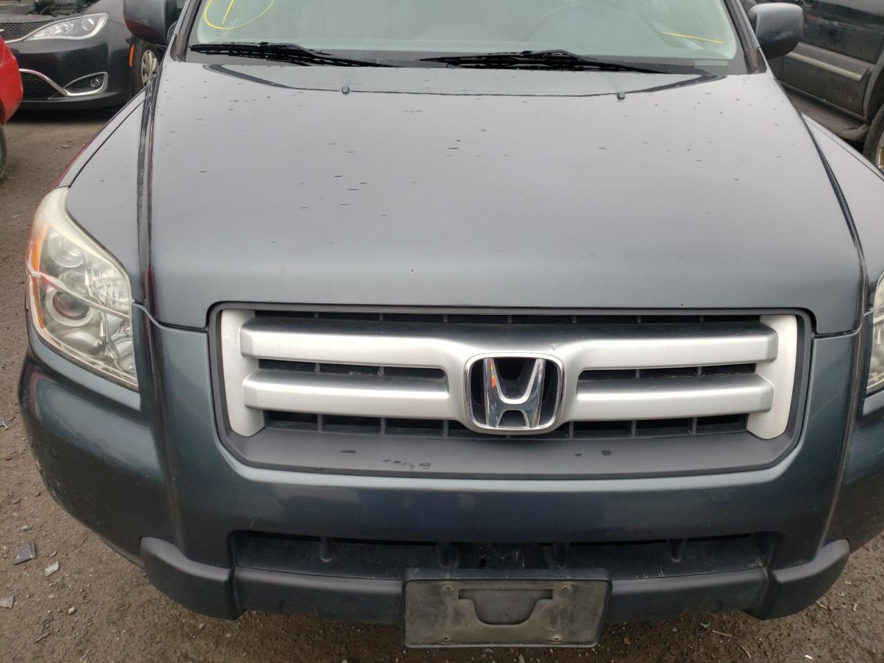 Photo 9 from auction – 2006 HONDA PILOT EX with VIN 2HKYF184X6H546959