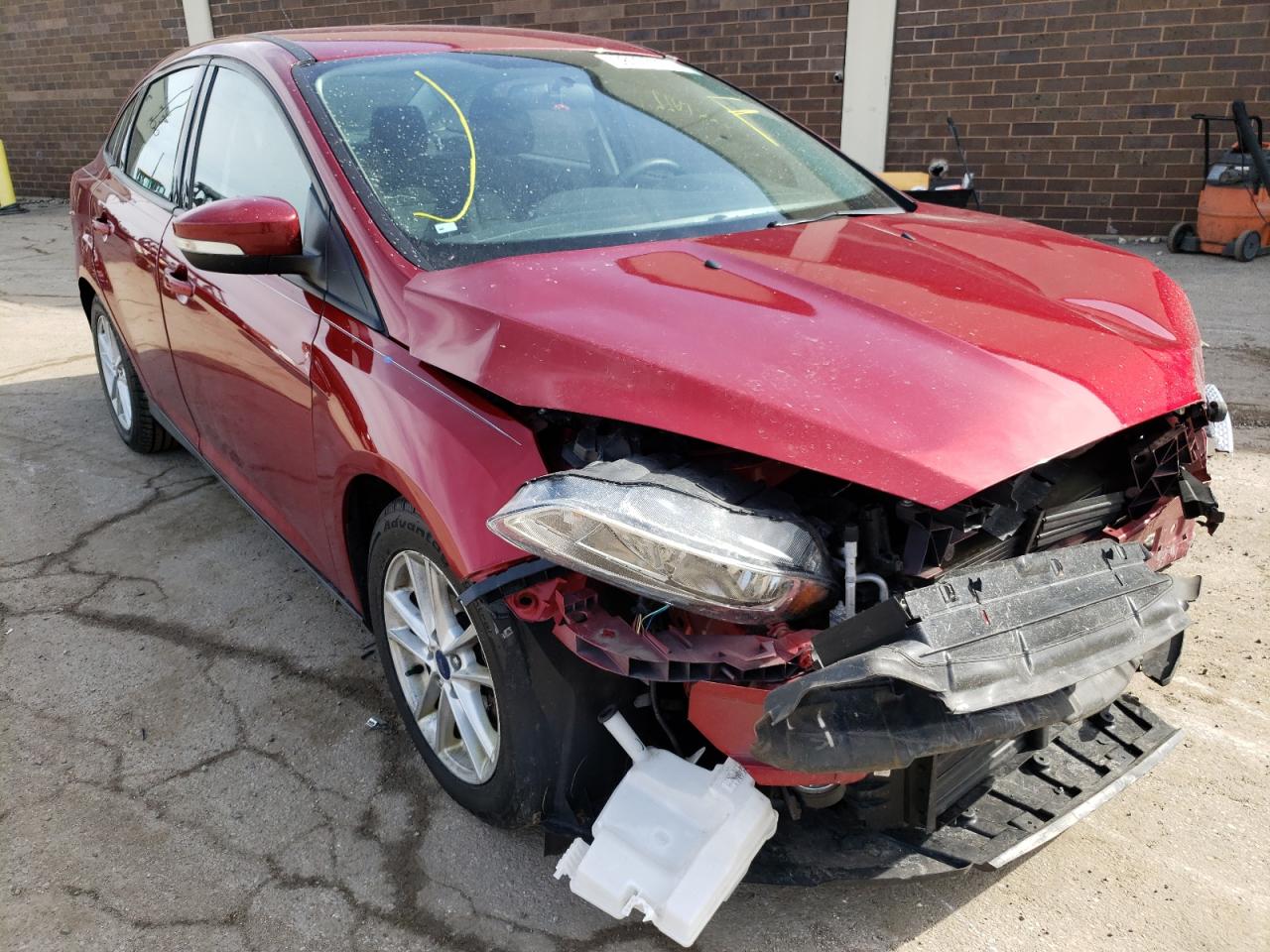 FORD FOCUS SE 2016 with VIN 1FADP3F25GL335809 - Photo from auction