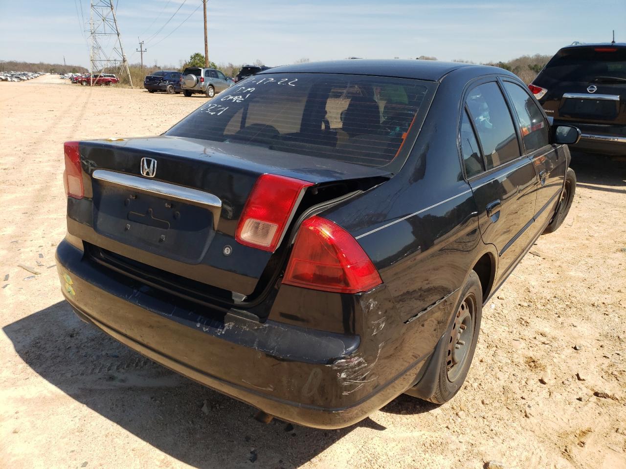 Photo 4 from auction – 2002 HONDA CIVIC LX with VIN 1HGES16592L050231