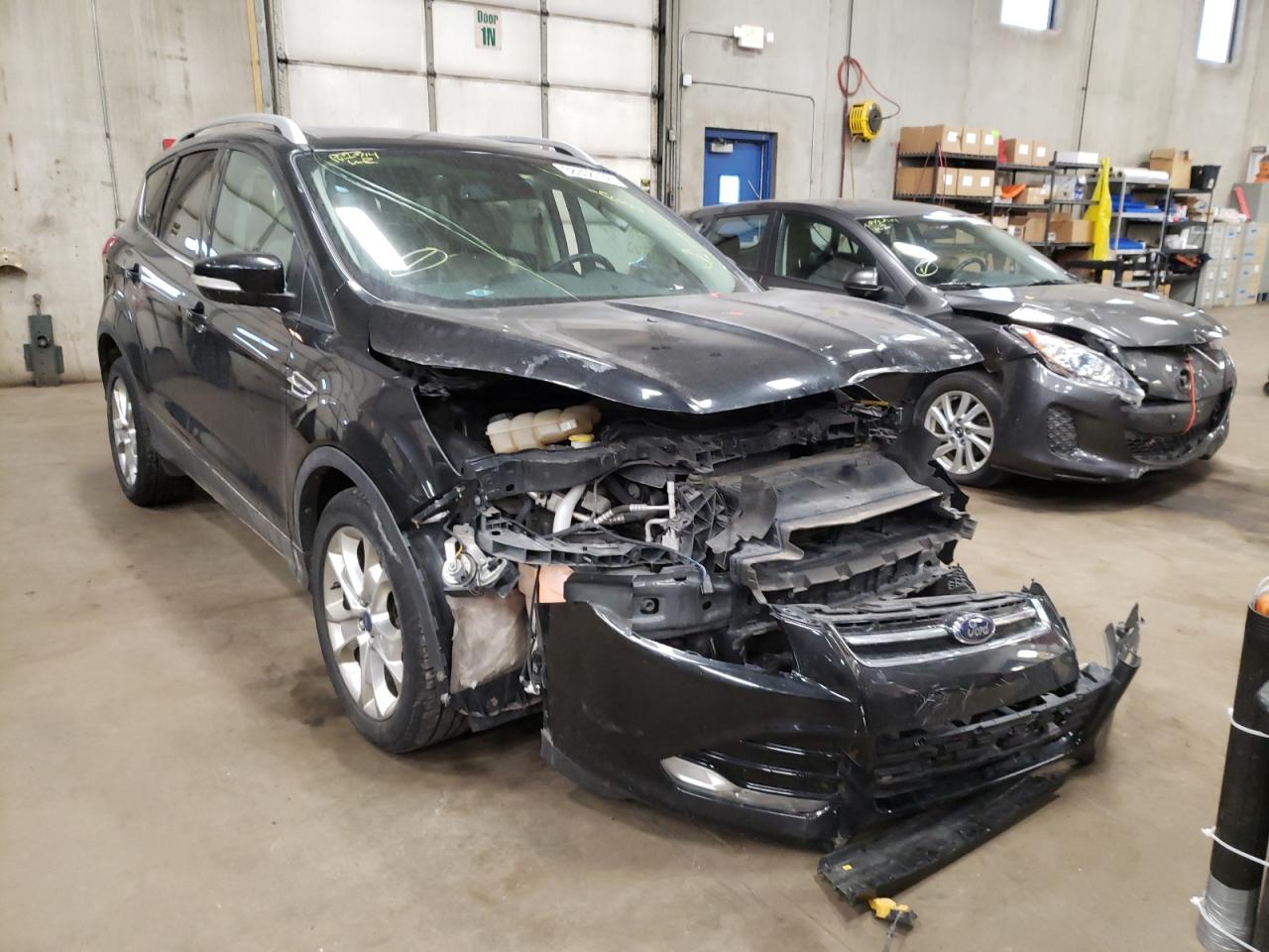 FORD ESCAPE TIT 2014 with VIN 1FMCU9J96EUB98792 - Photo from auction