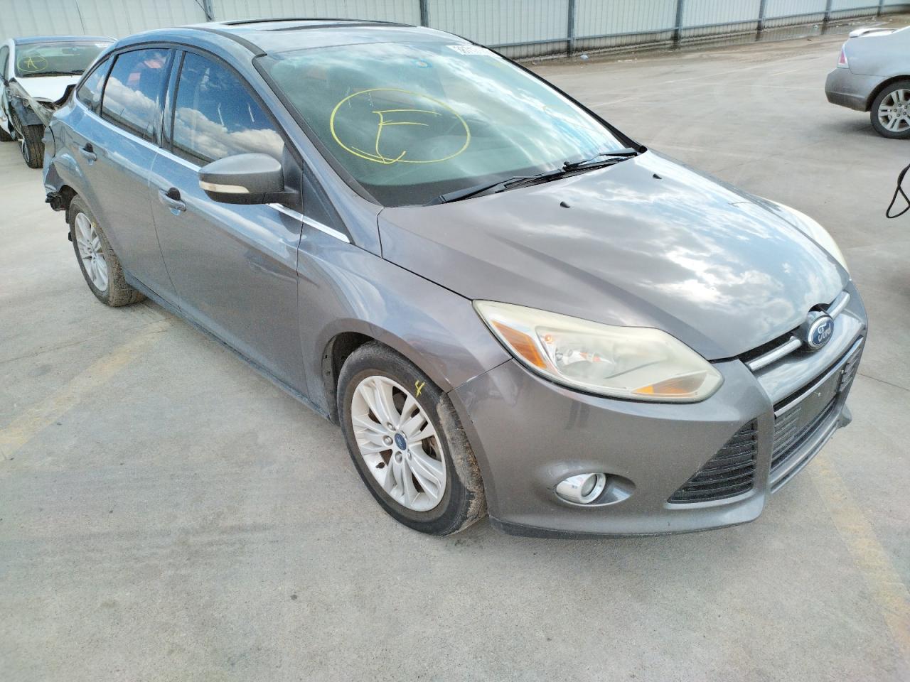 FORD FOCUS SEL 2012 with VIN 1FAHP3H21CL161861 - Photo from auction