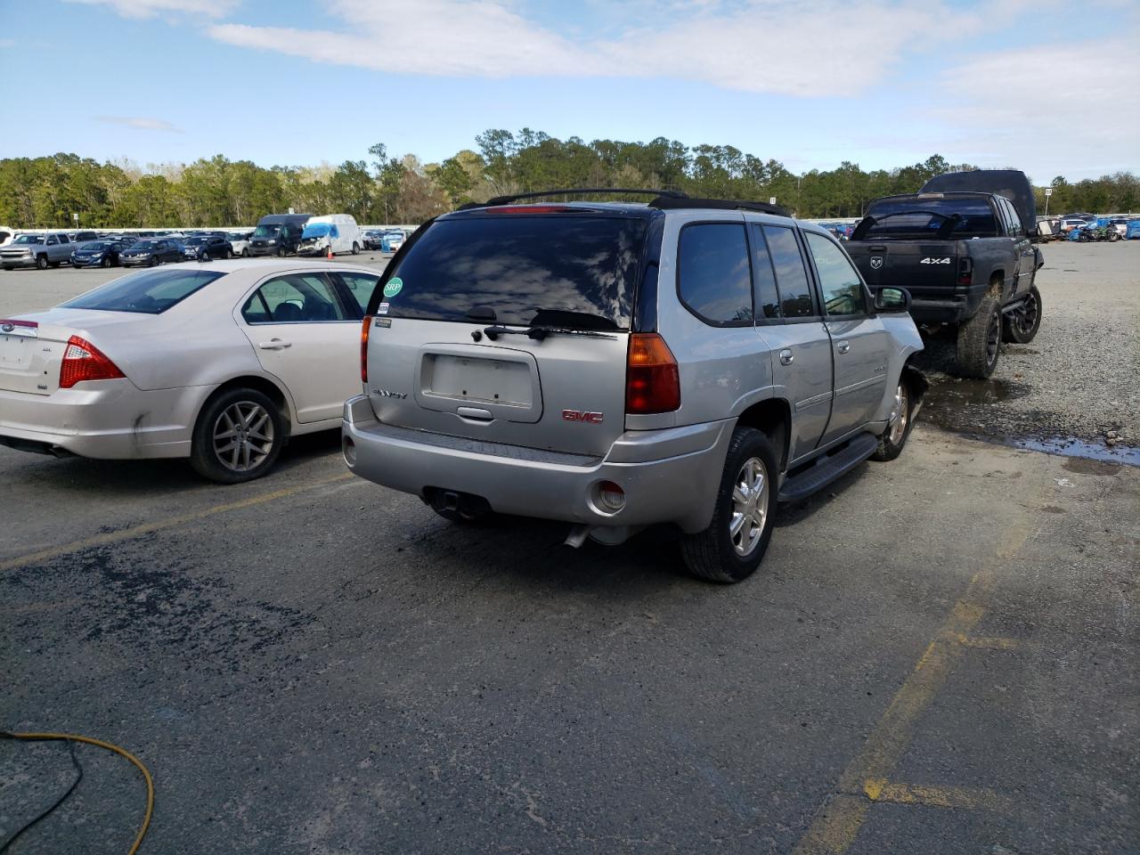 Photo 4 from auction – 2006 GMC ENVOY with VIN 1GKDS13S962256153