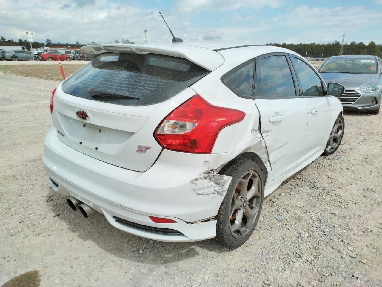 Photo 4 from auction – 2014 FORD FOCUS ST with VIN 1FADP3L96EL357462