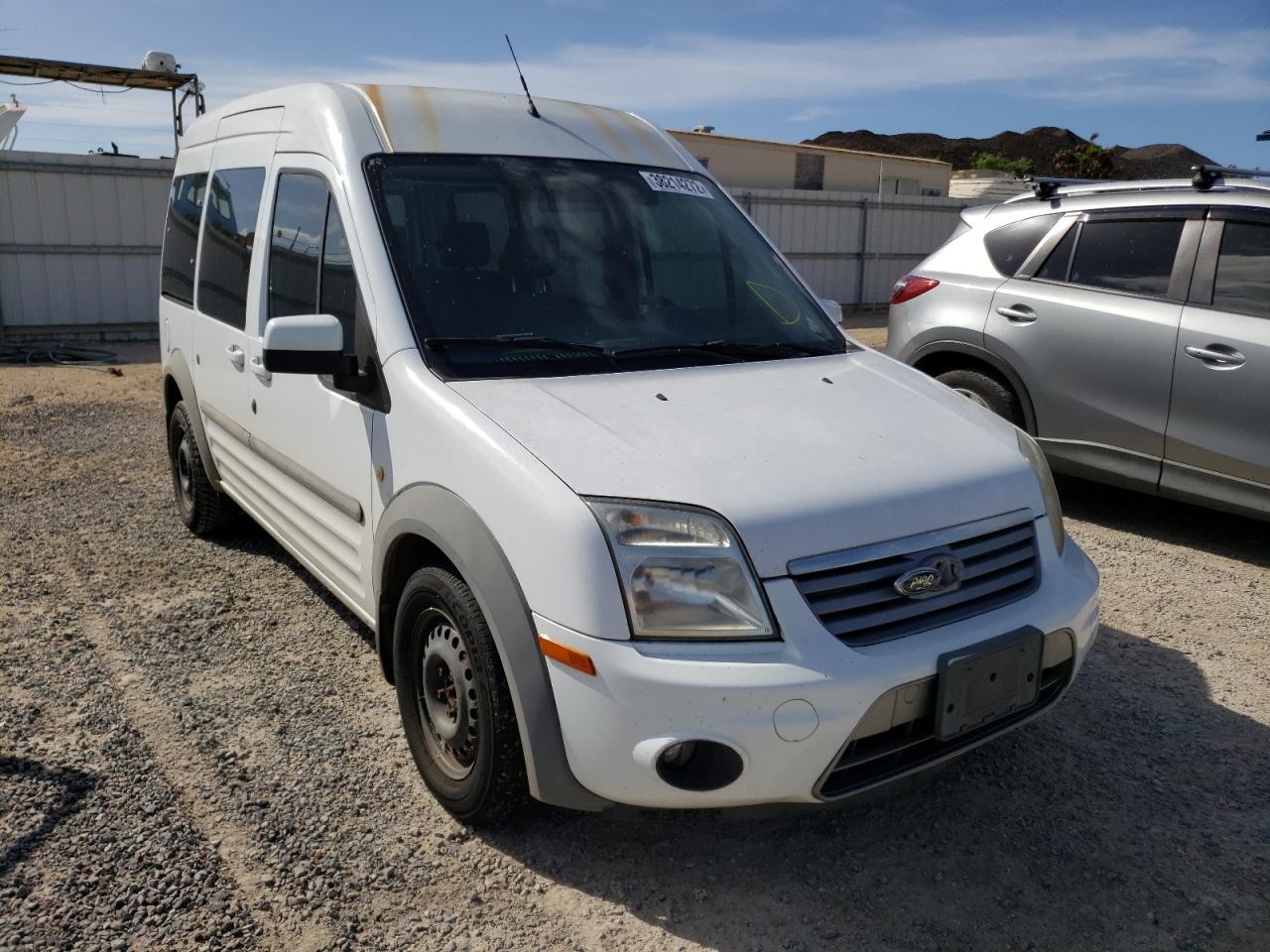 FORD TRANSIT CO 2011 with VIN NM0KS9CN1BT057448 - Photo from auction
