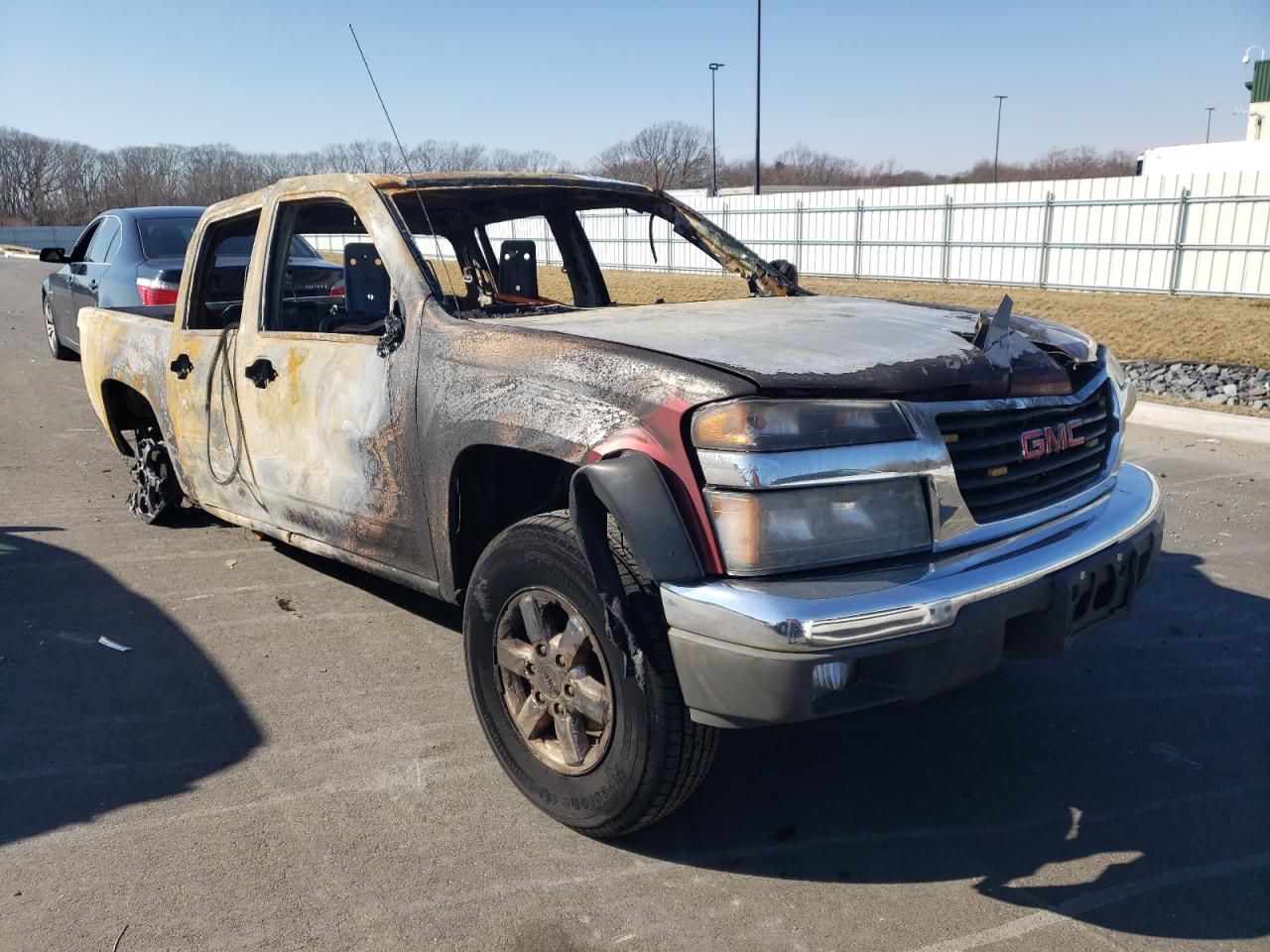 GMC CANYON SLE 2011 with VIN 1GTH6MFE2B8109558 - Photo from auction