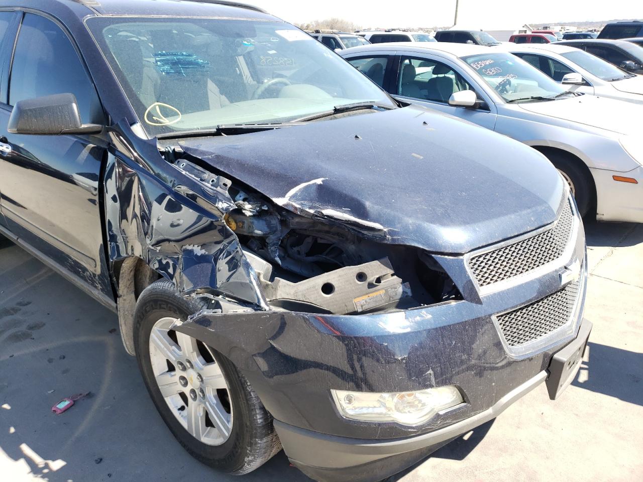 Photo 9 from auction – 2012 CHEVROLET TRAVERSE L with VIN 1GNKRFED6CJ347822