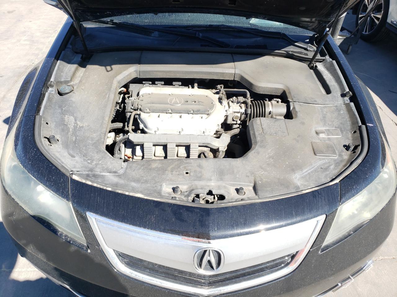 Photo 7 from auction – 2012 ACURA TL with VIN 19UUA8F51CA009998