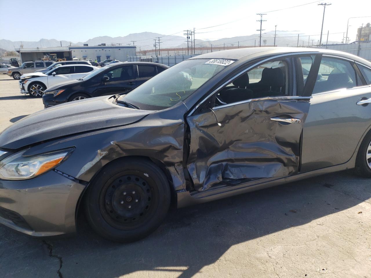 Photo 9 from auction – 2016 NISSAN ALTIMA 2.5 with VIN 1N4AL3AP6GN353337