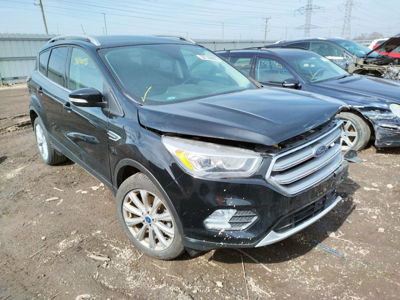 FORD ESCAPE TIT 2017 with VIN 1FMCU9JD7HUE44211 - Photo from auction