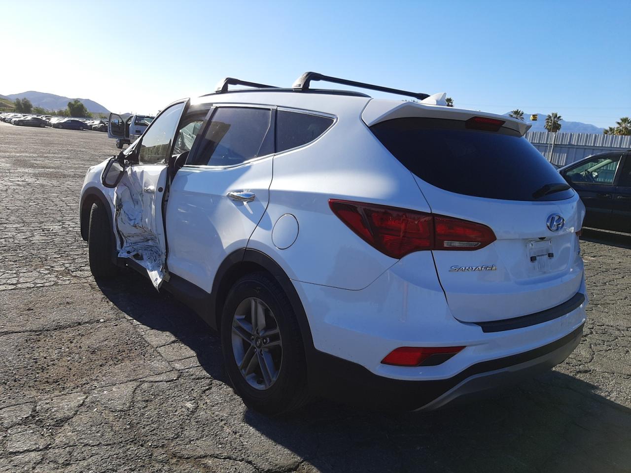 Photo 3 from auction – 2017 HYUNDAI SANTA FE S with VIN 5NMZU3LB9HH034072