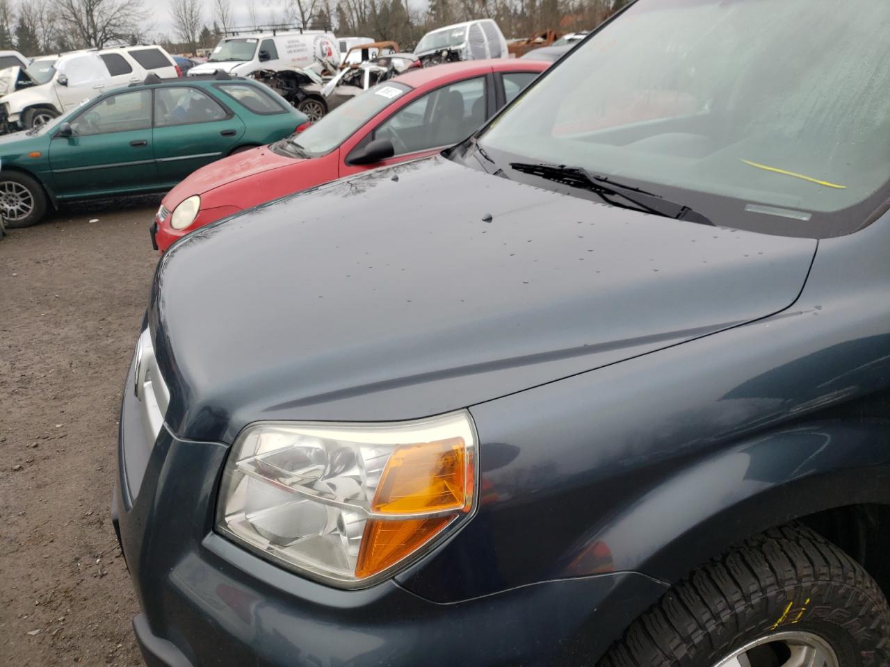 Photo 10 from auction – 2006 HONDA PILOT EX with VIN 2HKYF184X6H546959